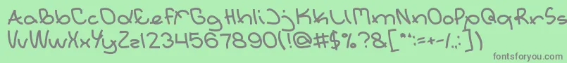 フォントExtraordinary – 緑の背景に灰色の文字