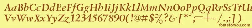 フォントUkrainianlazurskiBolditalic – 茶色の文字が黄色の背景にあります。