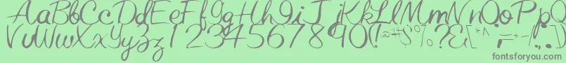 フォントElasticRegularTtstd – 緑の背景に灰色の文字