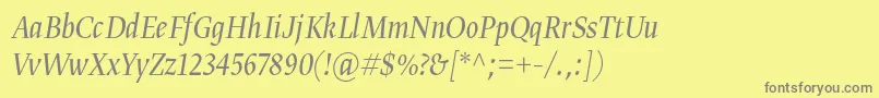 Gretadisnarproligita Font – Gray Fonts on Yellow Background