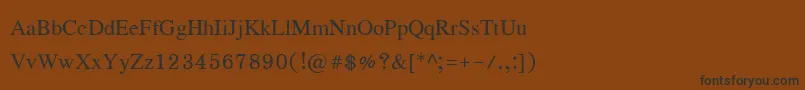 フォントEucrosiaupc – 黒い文字が茶色の背景にあります