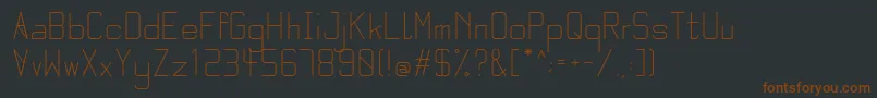 Шрифт QuarterRegular – коричневые шрифты на чёрном фоне