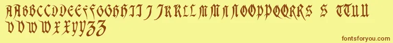 MagdelenaRegular-Schriftart – Braune Schriften auf gelbem Hintergrund
