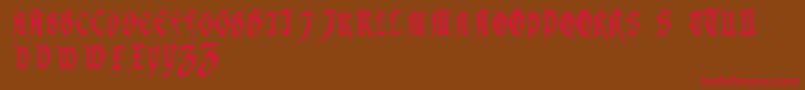 MagdelenaRegular Font – Red Fonts on Brown Background