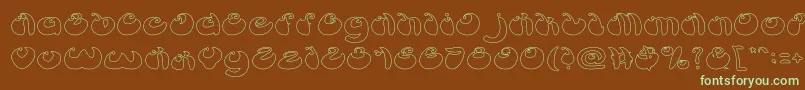ButterflyHollow-fontti – vihreät fontit ruskealla taustalla