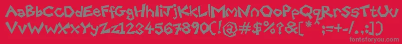 FreakyPaperCutouts Font – Gray Fonts on Red Background