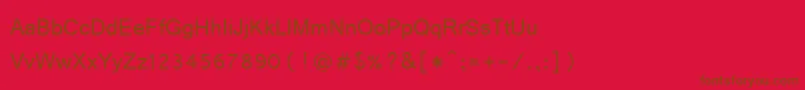 Vrinda-fontti – ruskeat fontit punaisella taustalla