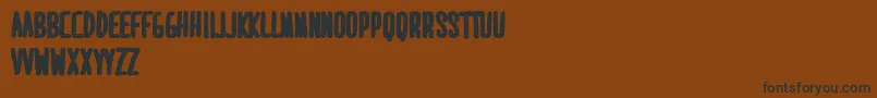 MaridavidExtrabold Font – Black Fonts on Brown Background