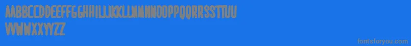 MaridavidExtrabold-fontti – harmaat kirjasimet sinisellä taustalla
