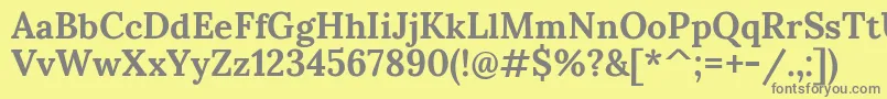 SumanaBold-fontti – harmaat kirjasimet keltaisella taustalla