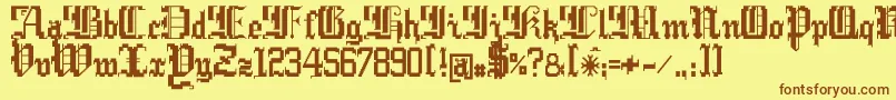 フォントArgorCwarScaqh – 茶色の文字が黄色の背景にあります。