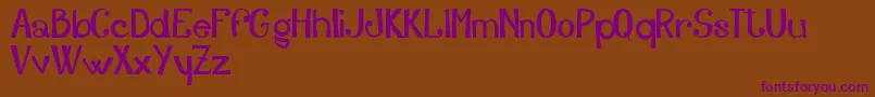 AdelfyFreeVersion Font – Purple Fonts on Brown Background