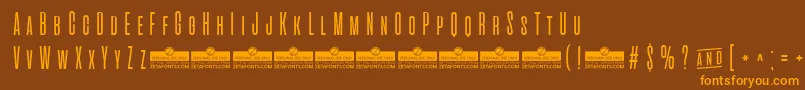 AlienscowsLightTrial Font – Orange Fonts on Brown Background