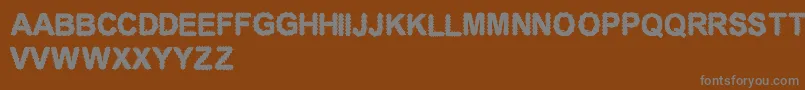 CfelectronicboardRegular-Schriftart – Graue Schriften auf braunem Hintergrund