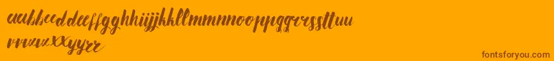 AnanasLips Font – Brown Fonts on Orange Background