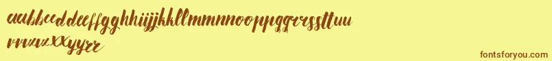 AnanasLips Font – Brown Fonts on Yellow Background