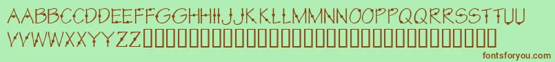 KrCirkle Font – Brown Fonts on Green Background