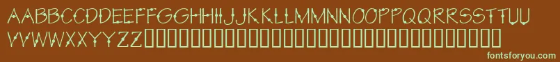フォントKrCirkle – 緑色の文字が茶色の背景にあります。