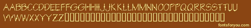 KrCirkle-fontti – keltaiset fontit ruskealla taustalla