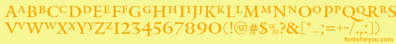 フォントMonumentRegular – オレンジの文字が黄色の背景にあります。