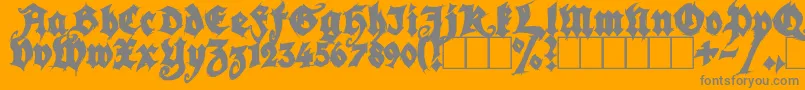 SeasonOfTheWitchBlack-Schriftart – Graue Schriften auf orangefarbenem Hintergrund