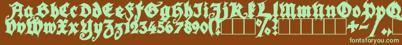 SeasonOfTheWitchBlack-Schriftart – Grüne Schriften auf braunem Hintergrund