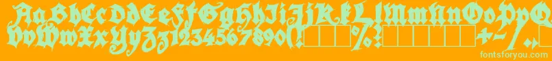 SeasonOfTheWitchBlack-fontti – vihreät fontit oranssilla taustalla