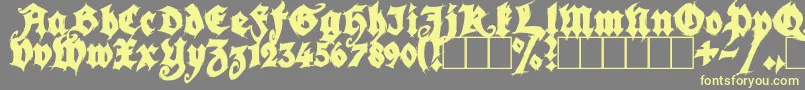 Шрифт SeasonOfTheWitchBlack – жёлтые шрифты на сером фоне