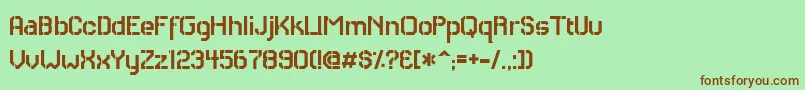 RhCarrierStencil-fontti – ruskeat fontit vihreällä taustalla