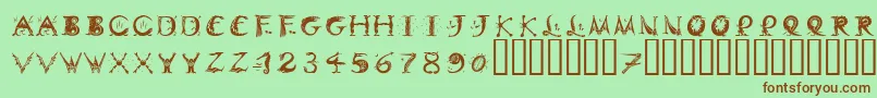 Шрифт DinitialsPositiveItcTt – коричневые шрифты на зелёном фоне