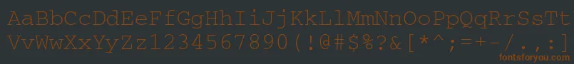 Czcionka Courierctt – brązowe czcionki na czarnym tle