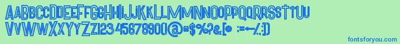 Czcionka Pineappleboldinline – niebieskie czcionki na zielonym tle