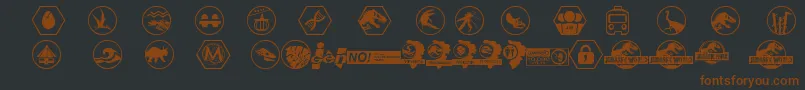 JurassicWorld-fontti – ruskeat fontit mustalla taustalla