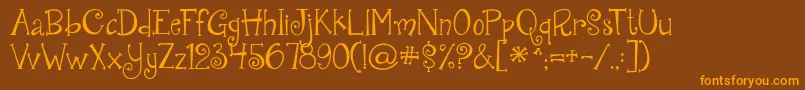 Jandaquirkygirl-Schriftart – Orangefarbene Schriften auf braunem Hintergrund