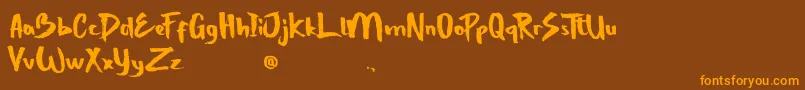 StrongBoldOne Font – Orange Fonts on Brown Background