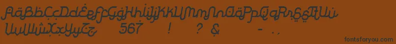 フォントRodjaSlanted – 黒い文字が茶色の背景にあります