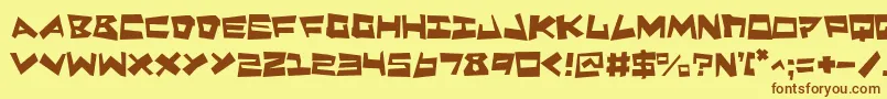 フォントQuakeShakeMax – 茶色の文字が黄色の背景にあります。