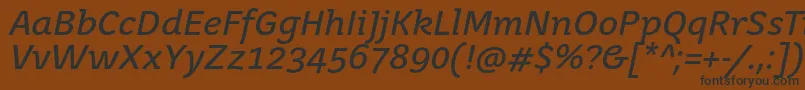JuvenistextItalic-fontti – mustat fontit ruskealla taustalla