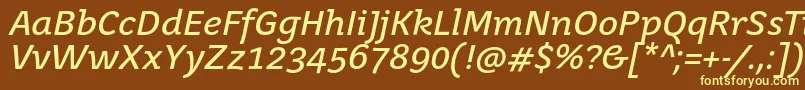 JuvenistextItalic-fontti – keltaiset fontit ruskealla taustalla