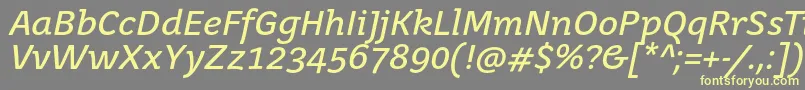 JuvenistextItalic-Schriftart – Gelbe Schriften auf grauem Hintergrund