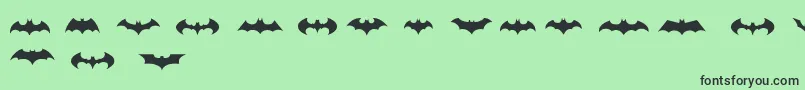 Police BatmanLogoEvolutionTfb – polices noires sur fond vert