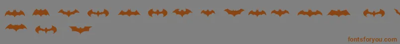 BatmanLogoEvolutionTfb Font – Brown Fonts on Gray Background