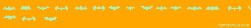 Fonte BatmanLogoEvolutionTfb – fontes verdes em um fundo laranja