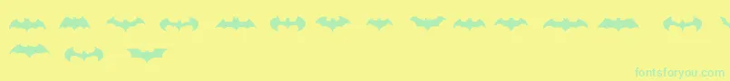 Fonte BatmanLogoEvolutionTfb – fontes verdes em um fundo amarelo