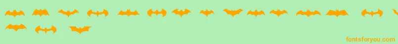 BatmanLogoEvolutionTfb Font – Orange Fonts on Green Background