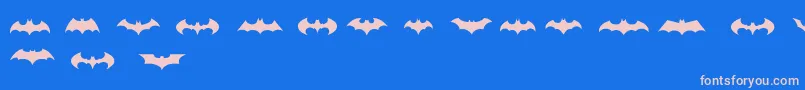 BatmanLogoEvolutionTfb-Schriftart – Rosa Schriften auf blauem Hintergrund