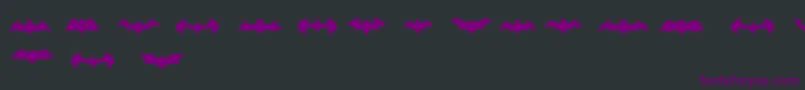 Czcionka BatmanLogoEvolutionTfb – fioletowe czcionki na czarnym tle