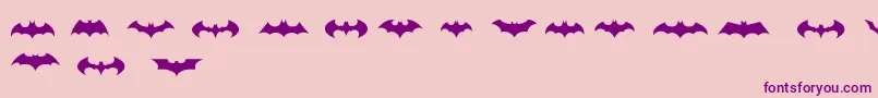 BatmanLogoEvolutionTfb-Schriftart – Violette Schriften auf rosa Hintergrund