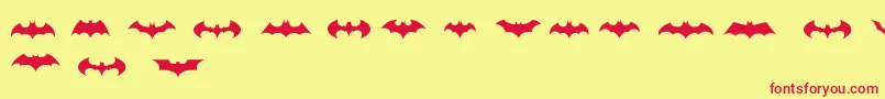 Fonte BatmanLogoEvolutionTfb – fontes vermelhas em um fundo amarelo