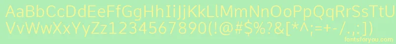 CommeLight Font – Yellow Fonts on Green Background